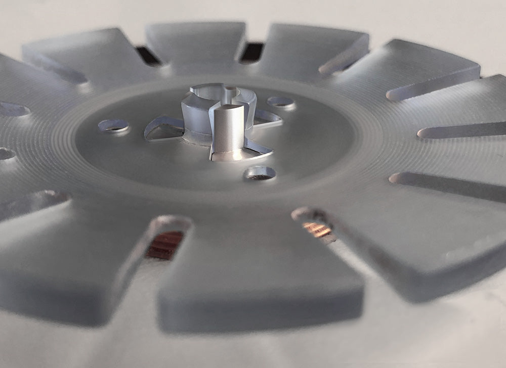 Wheel’s record clamping mechanism
